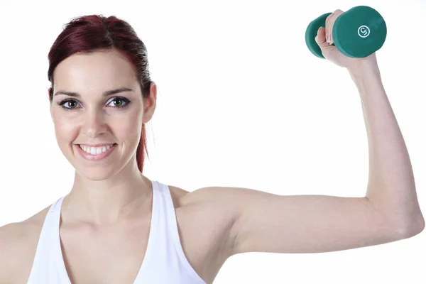 Jovem caucasiana fazendo exercícios de fitness, isolada em branco — Fotografia de Stock