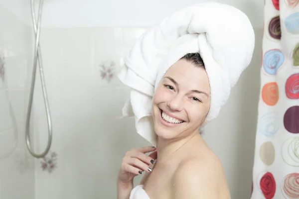 Shower woman. Happy smiling woman washing shoulder showering in — Stock Photo, Image