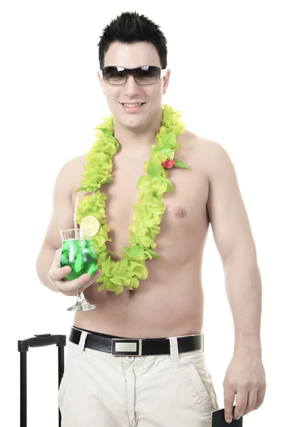 Portrait of a man smiling leaning on a suitcase holding a passpo — Stock Photo, Image