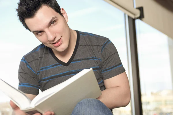 A beautiful 20 yars old men student studying. — Stock Photo, Image