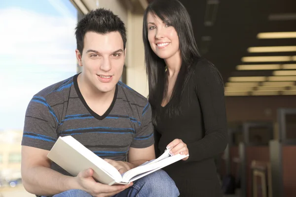 A 20 years old couple student studying. — Stock Photo, Image