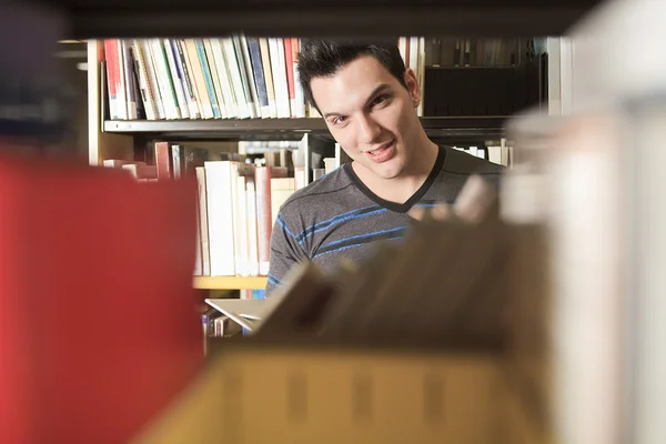 A beautiful 20 yars old men student studying. — Stock Photo, Image