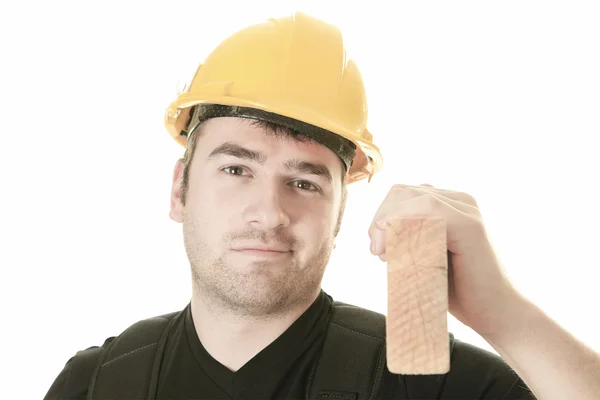 Un hombre experimentado carpenterin estudio fondo blanco — Foto de Stock