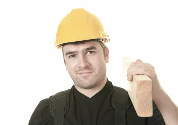 Un hombre experimentado carpenterin estudio fondo blanco — Foto de Stock