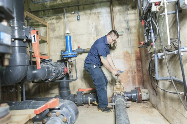 Repairman engineer of fire engineering system or heating system — Stock Photo, Image