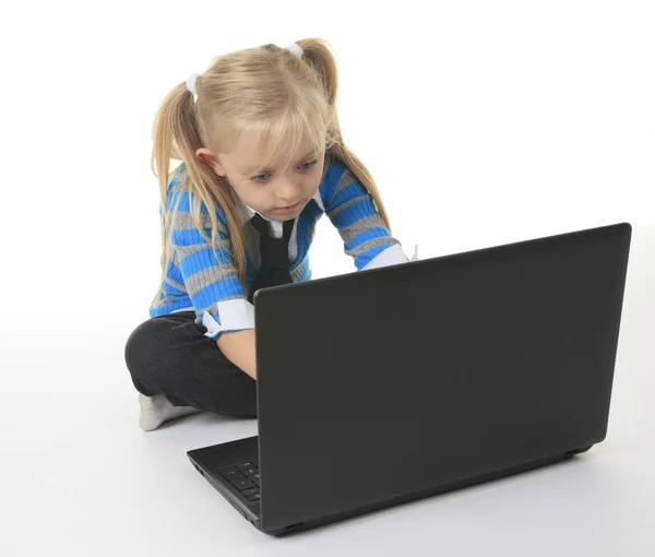 Smiley and pretty girl posing in studio against a white backgrou — Stock Photo, Image