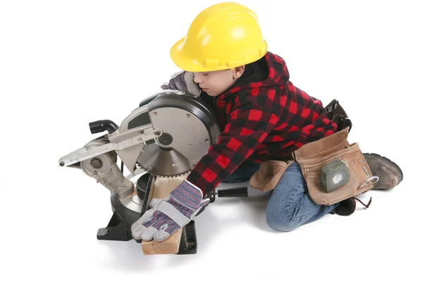 Young boy pretending to be a carpenter — Stock Photo, Image