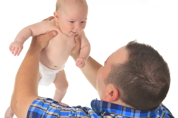 A Cute Caucasian baby holding by his father. — Stock Photo, Image