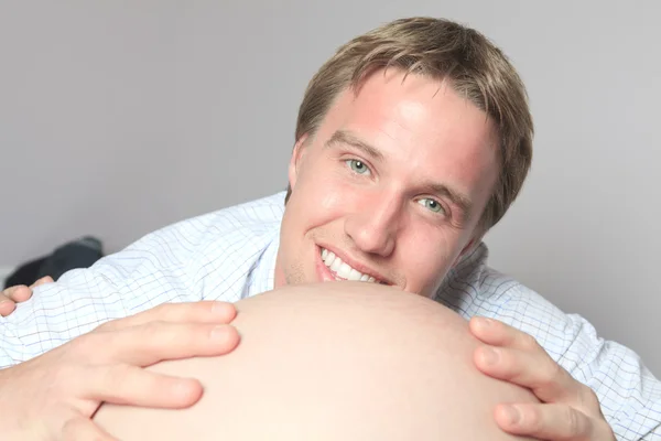 Pregnant woman belly with future father look — Stock Photo, Image