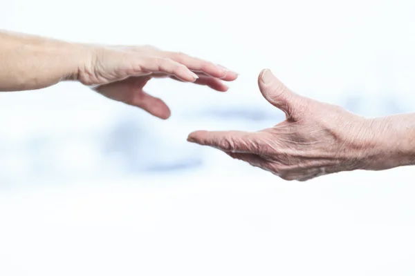 A hand try to catch an other hand — Stock Photo, Image