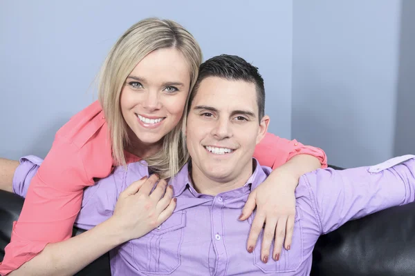 A Couple at home relaxing in sofa — Stock Photo, Image