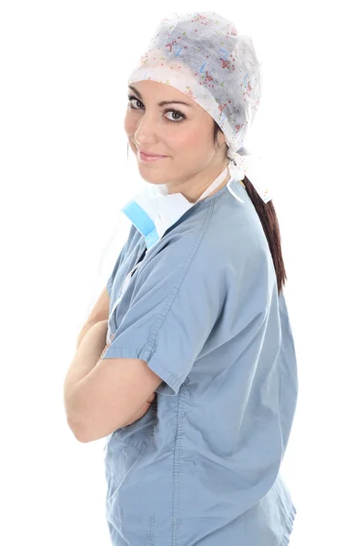 Μια χειρουργοί, γυναίκα, φορώντας στολές προστασίας, καπάκια και μάσκες ενός — Φωτογραφία Αρχείου
