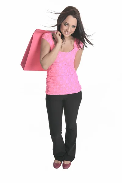 A young woman well dressed with bags on studio white background — Stock Photo, Image