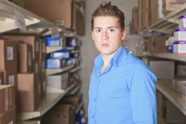 A Pretty warehouse manager checking the inventory — Stock Photo, Image