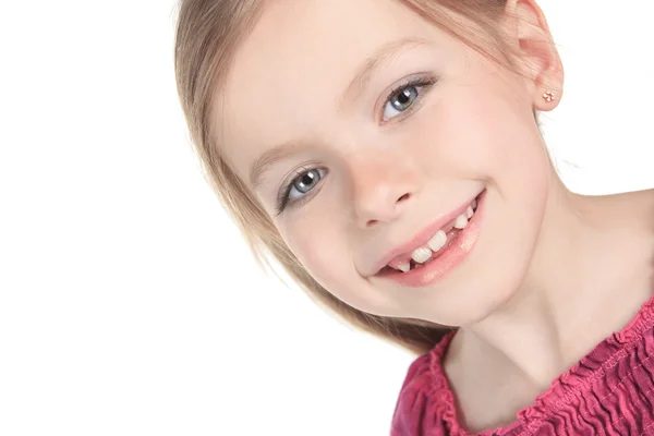 Uma menina bonita criança sobre um fundo branco . — Fotografia de Stock