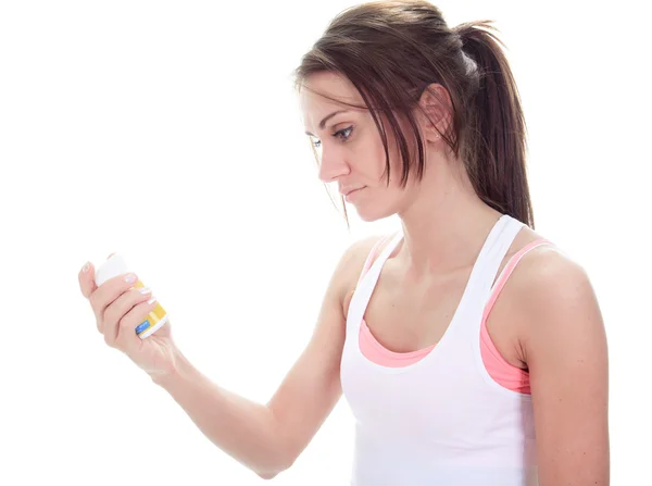 A Fitness woman in front of a white background — Stock Photo, Image