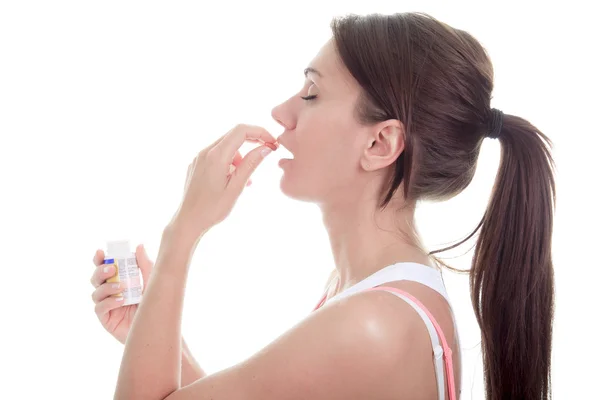 Een Fitness-vrouw voor een witte achtergrond — Stockfoto