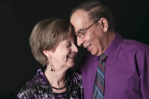 Senior Couple Isolated on a black Background — Stock Photo, Image