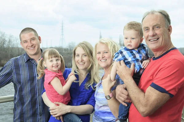 An Outside Family Portrait with gran father and mother — Stock Photo, Image