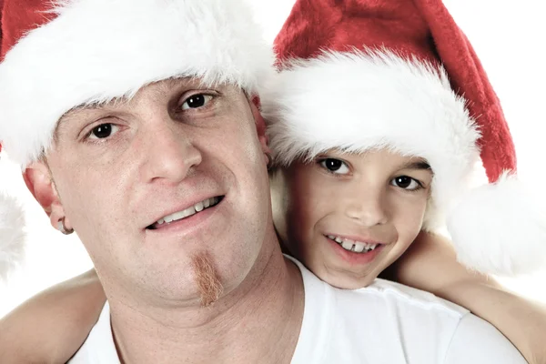 Christmas boy med är far inuti en studio vit bakgrund — Stockfoto