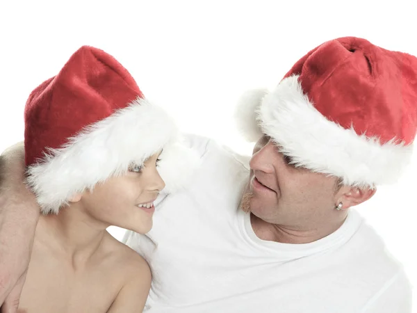 Menino de Natal com é pai dentro de um estúdio fundo branco — Fotografia de Stock