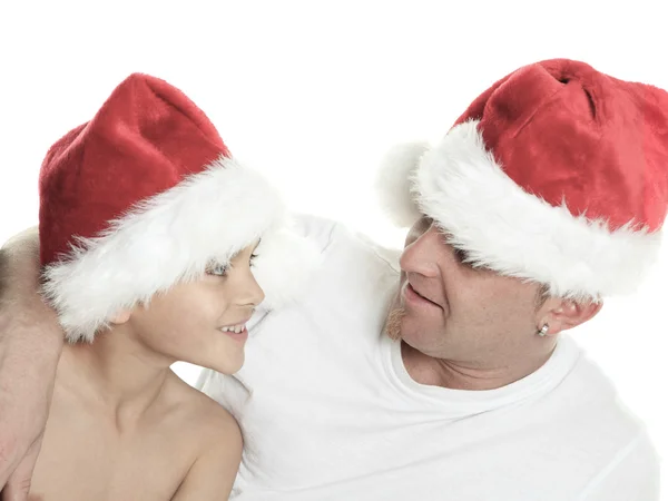 Niño de Navidad con es padre dentro de un estudio de fondo blanco — Foto de Stock