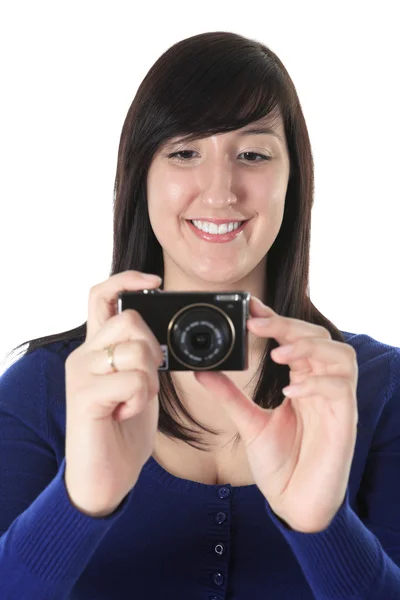 A teen with photo camera in studio white background — Stock Photo, Image