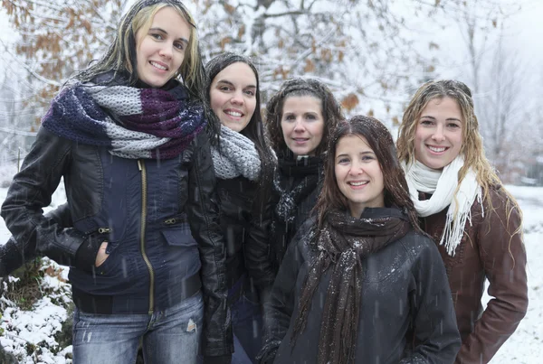 A Group of excited young girl friends outdoors in winter — Stock Photo, Image