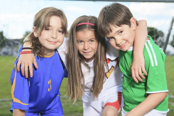 Childen play soccer on summer season — Stock Photo, Image