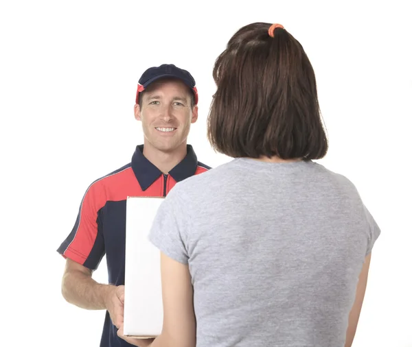 Delivery person delivering packages holding clipboard and packag — Stock Photo, Image