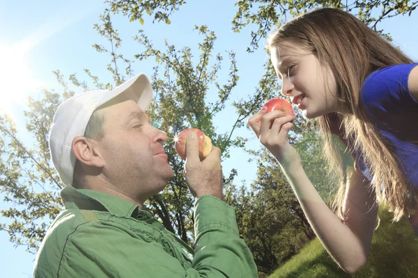 Happy father with daughter in autumn park — Stock Photo, Image