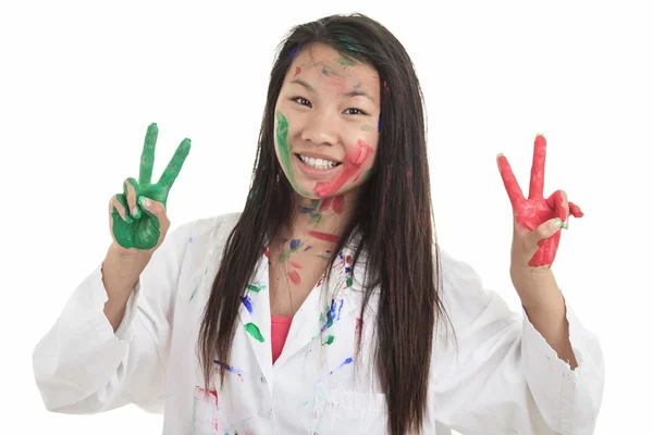 Um pouco asiático menina com tinta sobre ele isolar no branco — Fotografia de Stock