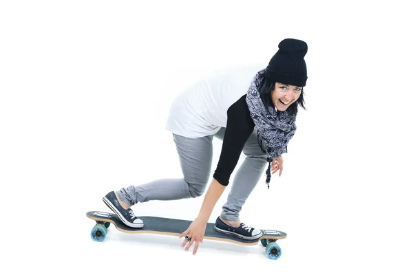 Mujer sosteniendo longboard aislado sobre un fondo blanco. Vista trasera —  Fotos de Stock