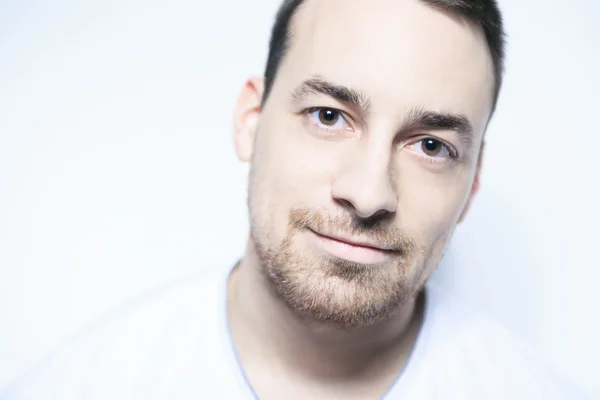 A male standing in studio white background — Stock Photo, Image