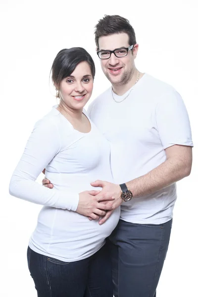 Un retrato de mujer embarazada feliz aislado sobre fondo blanco —  Fotos de Stock