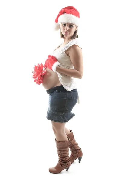 Mujer embarazada joven contra fondo blanco — Foto de Stock