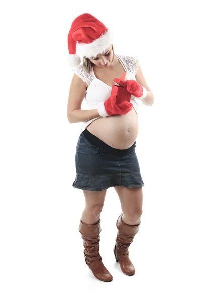 Mladá těhotná žena proti Bílému pozadí — Stock fotografie
