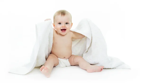 Dulce niño sentado en el estudio fondo blanco — Foto de Stock