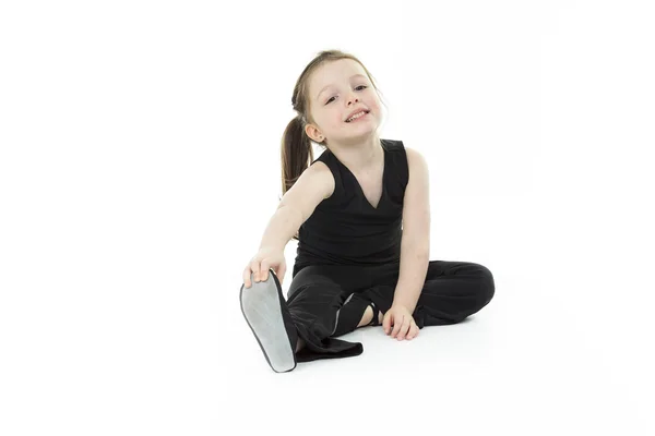 Image of flexible little girl in studio white — Stock Photo, Image