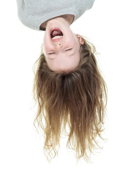 Young girl upside down isolated in white — Stock Photo, Image