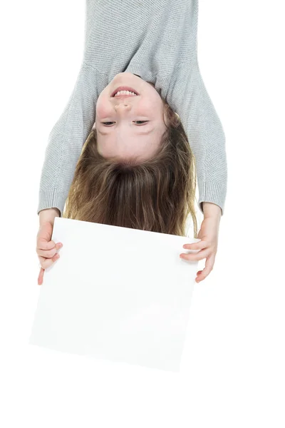 Young girl upside down isolated in white — Stock Photo, Image