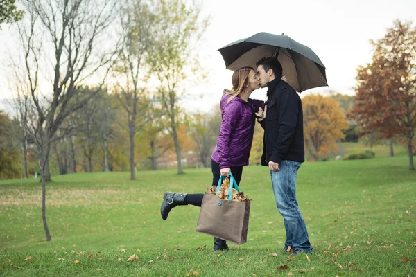 A Young happy couple in autumn season — Stock Photo, Image