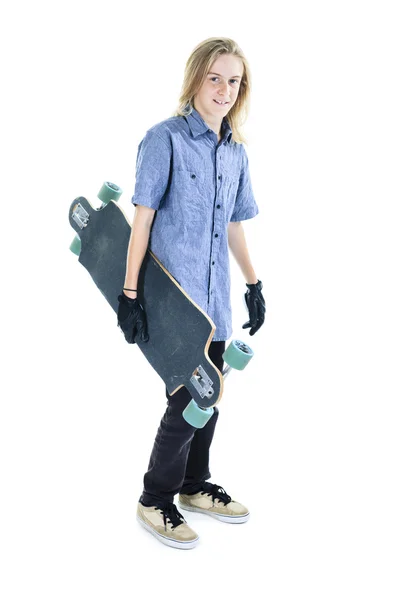 Un homme heureux avec longboard en studio — Photo