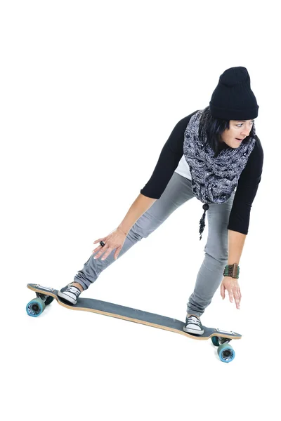 Mujer sosteniendo longboard aislado sobre un fondo blanco. Vista trasera — Foto de Stock