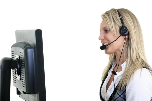 Affärskvinna med headset och skärmen på framsidan — Stockfoto