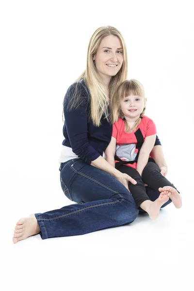 Een schattige blonde, moeder met zijn meisje — Stockfoto