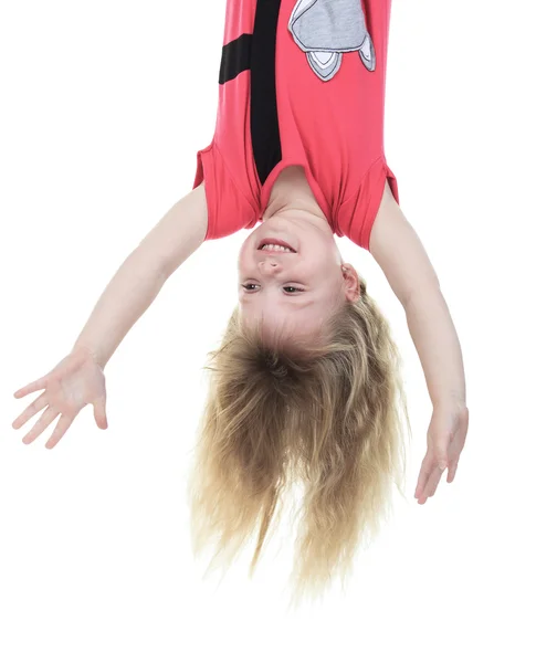 Smiling young girl upside down — Stock Photo, Image