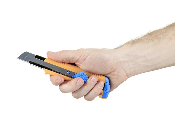 A man holding an exacto tool — Stock Fotó