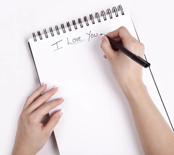 Note Pad with a hand write on it I Love you. — Stock Photo, Image