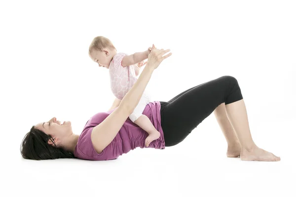 Mother and baby gymnastics yoga — Stockfoto